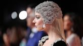 Anya Taylor-Joy’s Oscar After-Party Minidress Had an Exposed Bra and Dramatic Headpiece