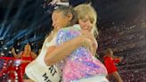 Taylor Swift hugs daughter of late Kobe Bryant while on stage in Los Angeles