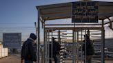 Israel reopens the main Gaza crossing for Palestinian laborers after days of rising tensions