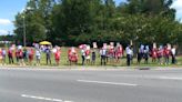 Dozens of airline workers protest to ‘end corporate greed’ outside CLT Airport