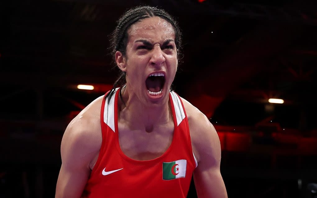 Gender-row boxer Imane Khelif cries ‘I am a woman’ after guaranteeing Olympic medal