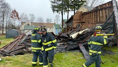 An old barn falls down like a house of cards, and a house is hit with pickles - The Boston Globe