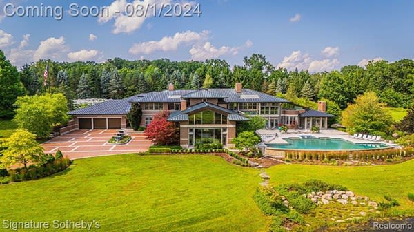 This Frank Lloyd Wright-inspired mansion in Ann Arbor just got a price drop