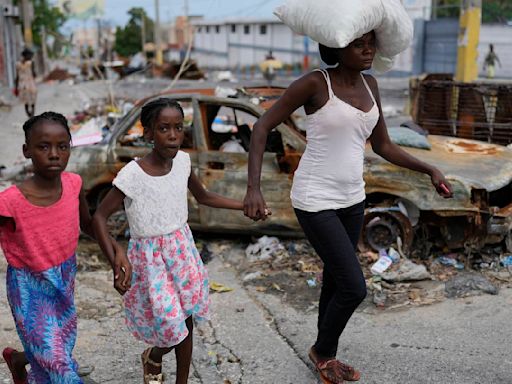 Gangs in Haiti launch fresh attacks, days after a new prime minister is announced