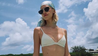 Devon Windsor flaunts her incredible figure in a white bikini