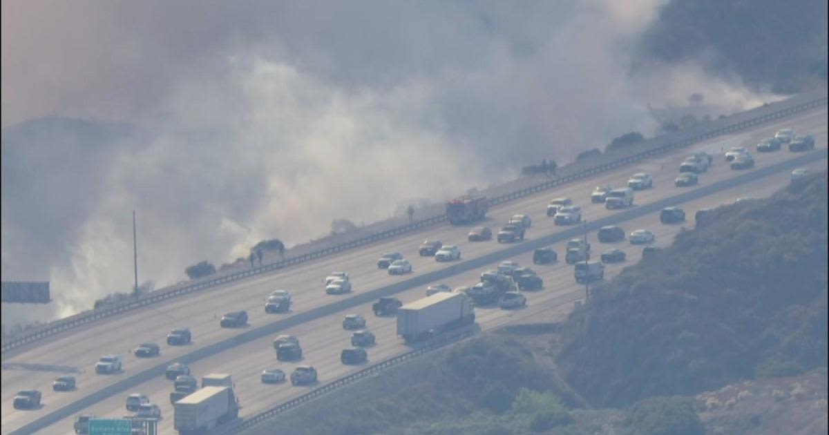 Crews battling brush fire burning near 210 Freeway in Tujunga