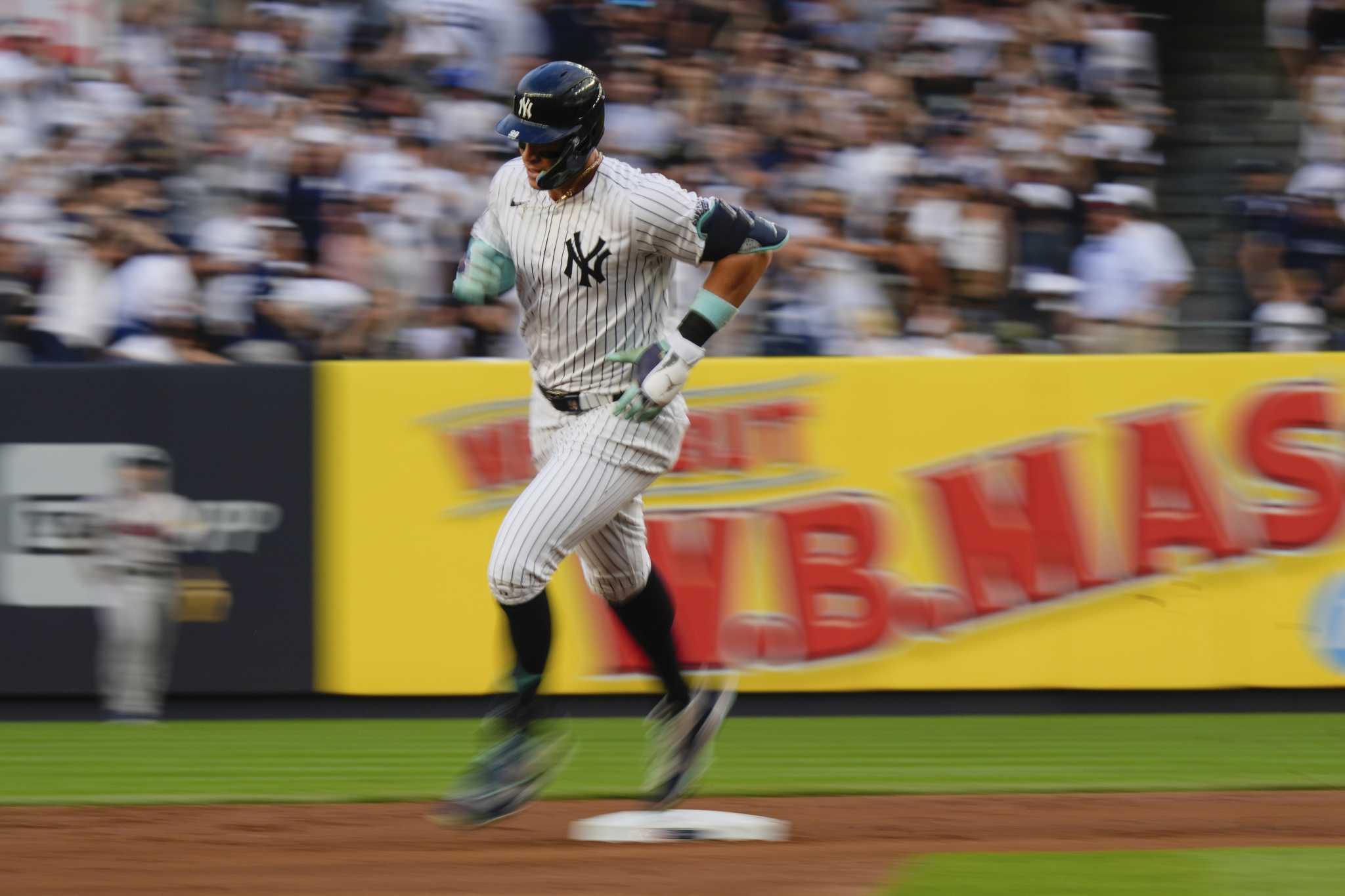 Judge hits 28th home run, Stanton hurts hamstring as Yankees beat Braves 8-3