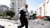 Israel reels from shock Hamas attack and warns of a long, difficult war