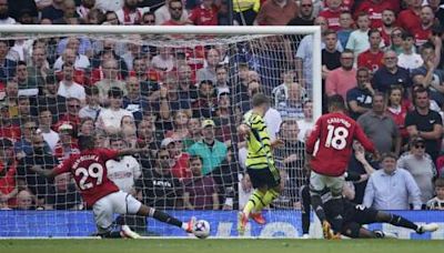 Arsenal beats Man United 1-0 to take title race with Man City to final day of Premier League season