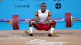 Weightlifter Cyrille Tchatchet’s medal hopes ended by body cramps