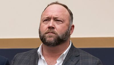 Alex Jones lashes out after agreeing to sell assets to pay legal debt to Sandy Hook families