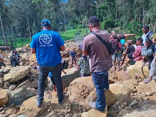 Australia plans to send aid to Papua New Guinea as rain raises safety fears at deadly landslide site