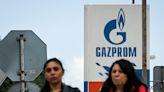 Russian gas giant Gazprom's shares slumped 30% after it nixed dividends for the first time since 1998