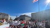Thousands of pro-Palestinian protesters chant 'Guilty!' and smear red paint on the gates in front of White House