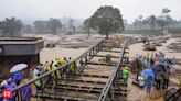 Indian soldiers building metal bridge to marooned area in Kerala landslides