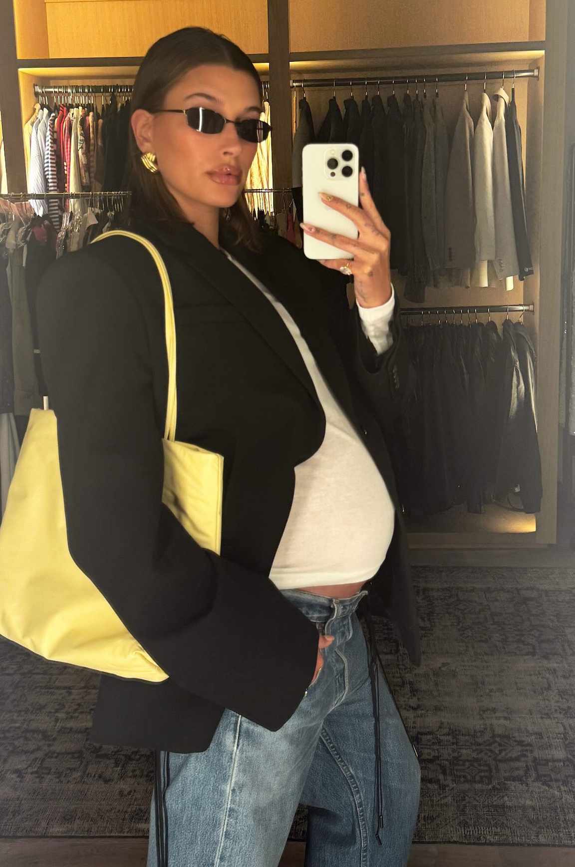 Pregnant Hailey Bieber Shows Off Growing Baby Bump While Posing in White T-Shirt and Jeans