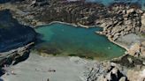 The hidden UK beach with bathing pool you can only access through a tunnel