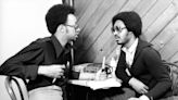 A young Leonard Pitts and Stevie Wonder sit at a table together. What’s the photo about?