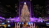 Christmas tree illuminated at Rockefeller Center