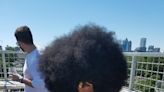 American teenage boy recognized for having largest afro in the world by Guinness World Records