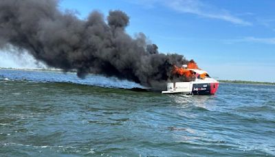 3 rescued after boat catches fire in Great South Bay south of Grand River