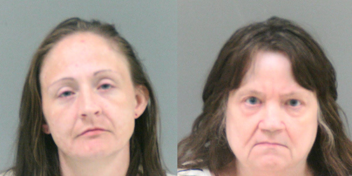 Women charged after incapacitated child found living among waste