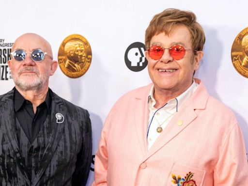 Elton John puts personal wardrobe on eBay for AIDS Foundation