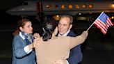 Americans released by Iran arrive home, tearfully embrace their loved ones and declare: 'Freedom!'