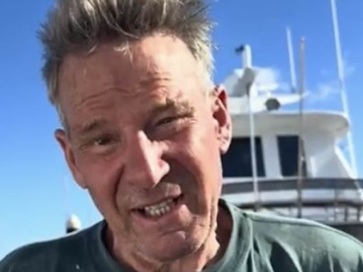 Sam Newman rushed to hospital after his boat set fire