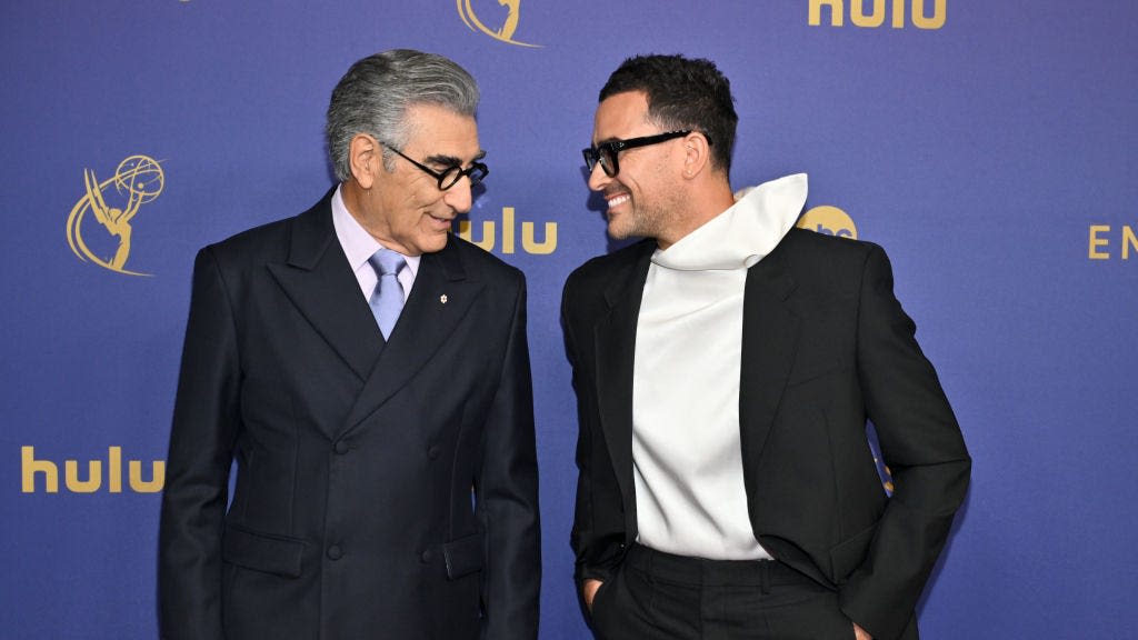 Eugene and Dan Levy Show Off Their Different Takes on the Suit at the Emmys