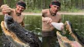 Man feeds giant alligator with bare hands in terrifying viral video as it crushes turkey leg