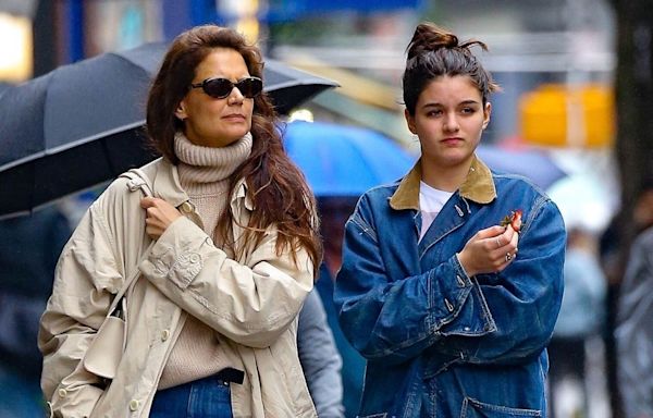 Suri and Katie look tense after daughter drops estranged dad Tom's last name