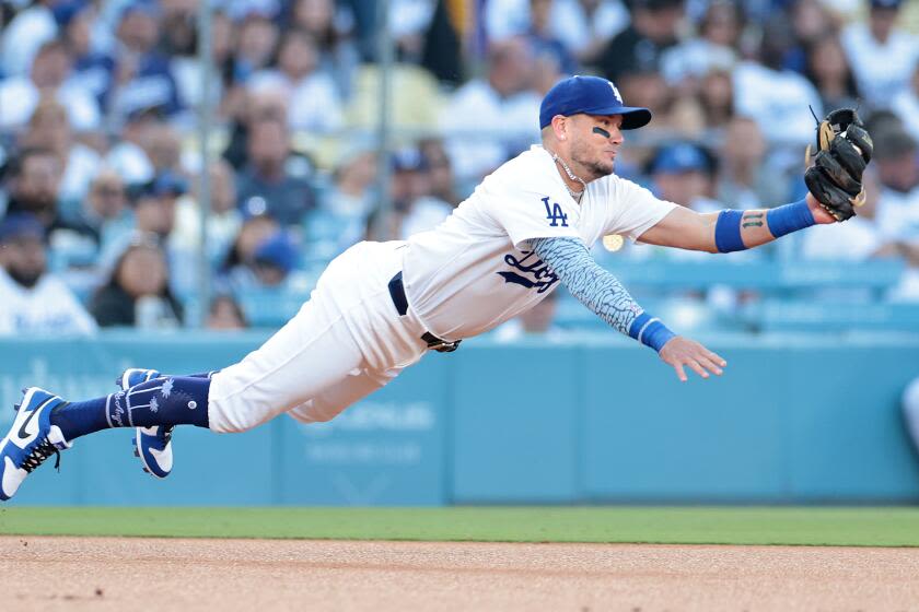 Miguel Rojas is shining at shortstop. Will Dodgers keep him there when Mookie Betts returns?