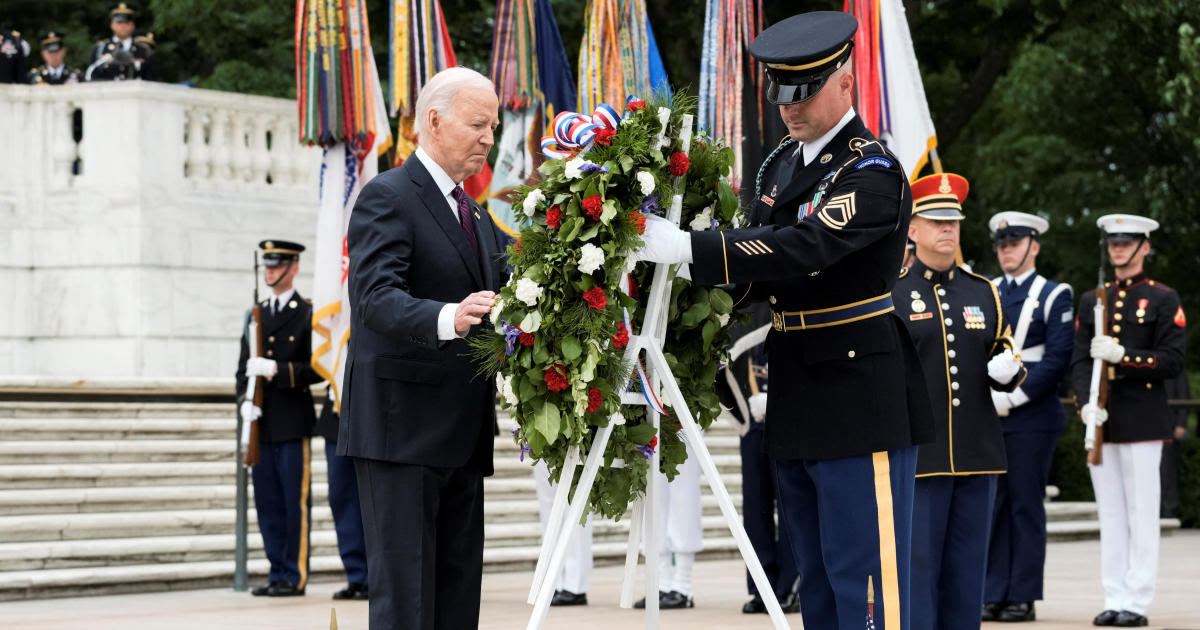 Biden honors fallen troops on Memorial Day, praising commitment "not to a president," but to idea of America