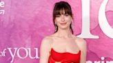 Anne Hathaway Is a Scarlet Bombshell in a Body-Sculpting Gown With Cutouts