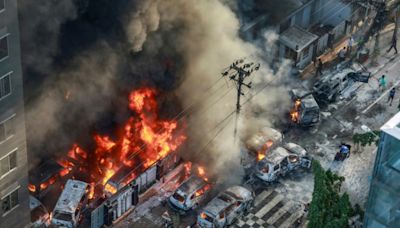 Bangladesh capital bans rallies after government buildings torched