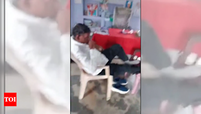 Drunk teacher caught on cam | India News - Times of India