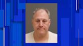 Former Warren city councilman charged with carrying gun without license