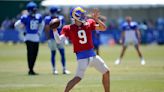 Stafford downplays elbow injury, throws in Rams practice