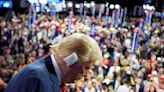 A subdued Donald Trump takes the stage at Republican National Convention in Milwaukee