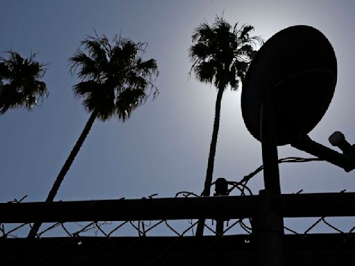 DirecTV clinches long-elusive deal to combine with Dish