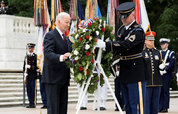 Biden honors fallen troops on Memorial Day, praising their commitment "not to a president," but to the idea of America
