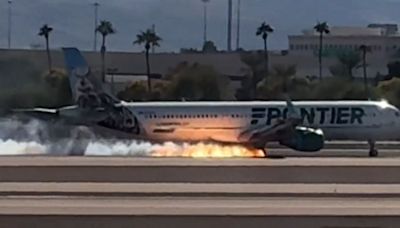 Flames seen under Frontier Airlines flight as it makes hard landing in Las Vegas