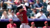 Walker homers twice, hitting 2-run shot in 8th in Diamondbacks' 9-7 victory over Rockies