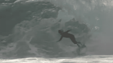 7-Year-Old Surfer Wipes Out at Super Sketchy Slab Wave (Video)