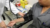 High blood pressure, cholesterol before age 55, even if treated, can boost heart disease risk