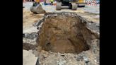 Sewer collapse opens large hole in street near downtown Louisville, repairs underway