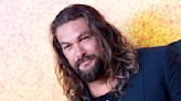 Jason Momoa flashes his bare butt during a fishing trip with friends