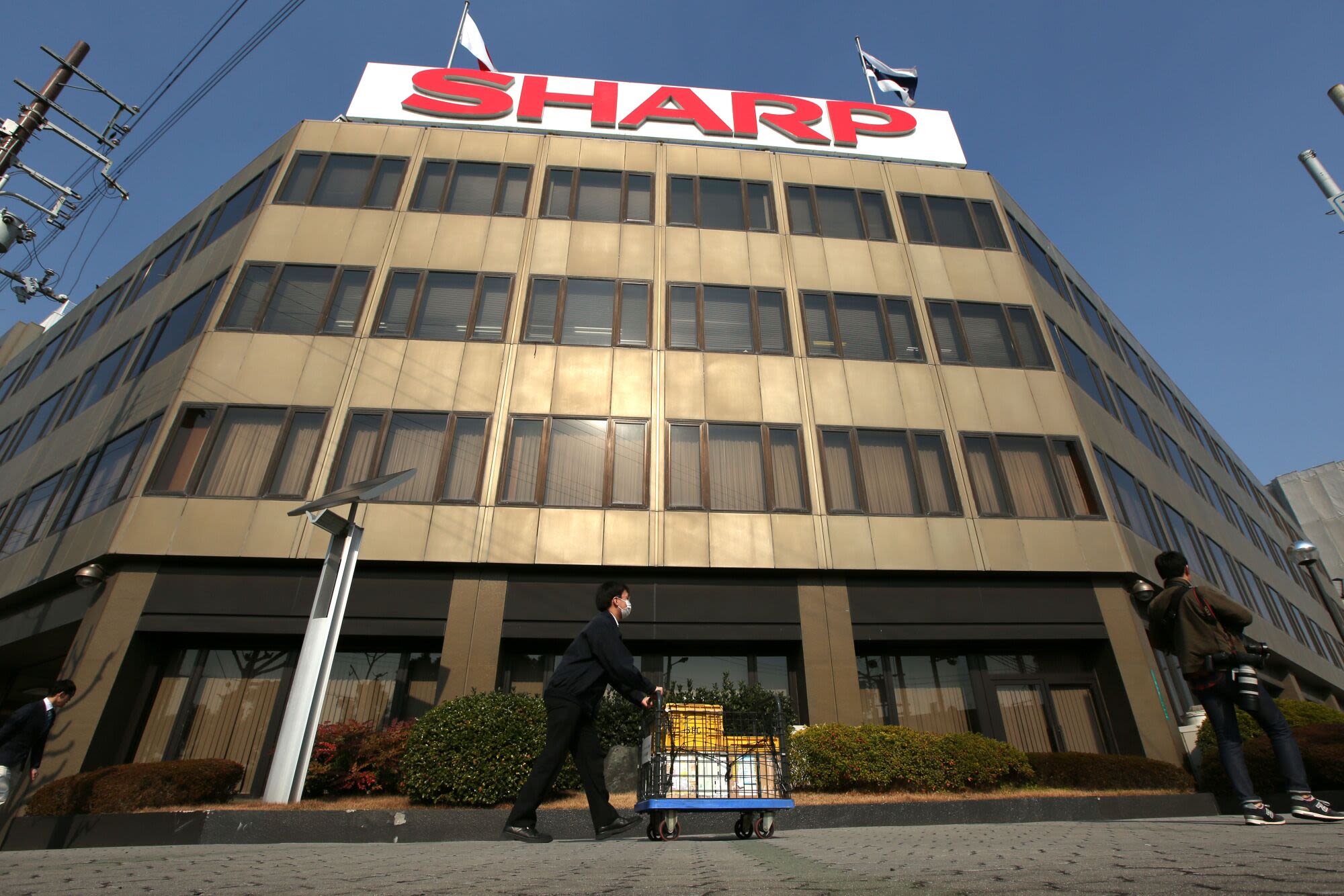 Foxconn-Backed Sharp to End TV Display Production, Cut Staff