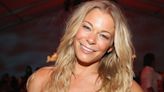 LeAnn Rimes Stuns in a Low-Cut Maxi Dress as She Frolicks on the Beach